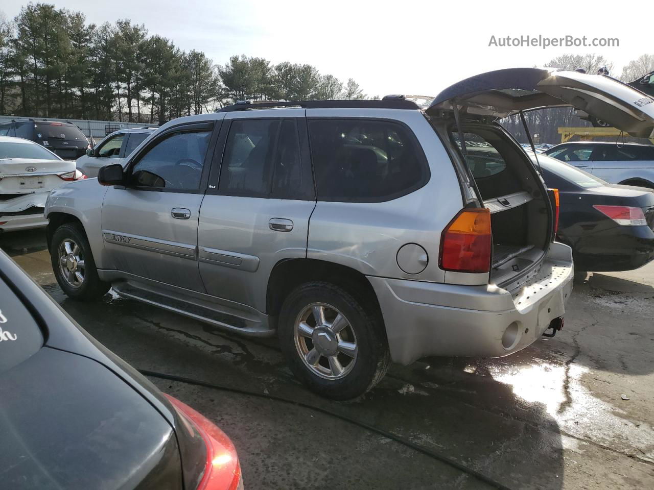 2004 Gmc Envoy  Серебряный vin: 1GKDT13S542141950