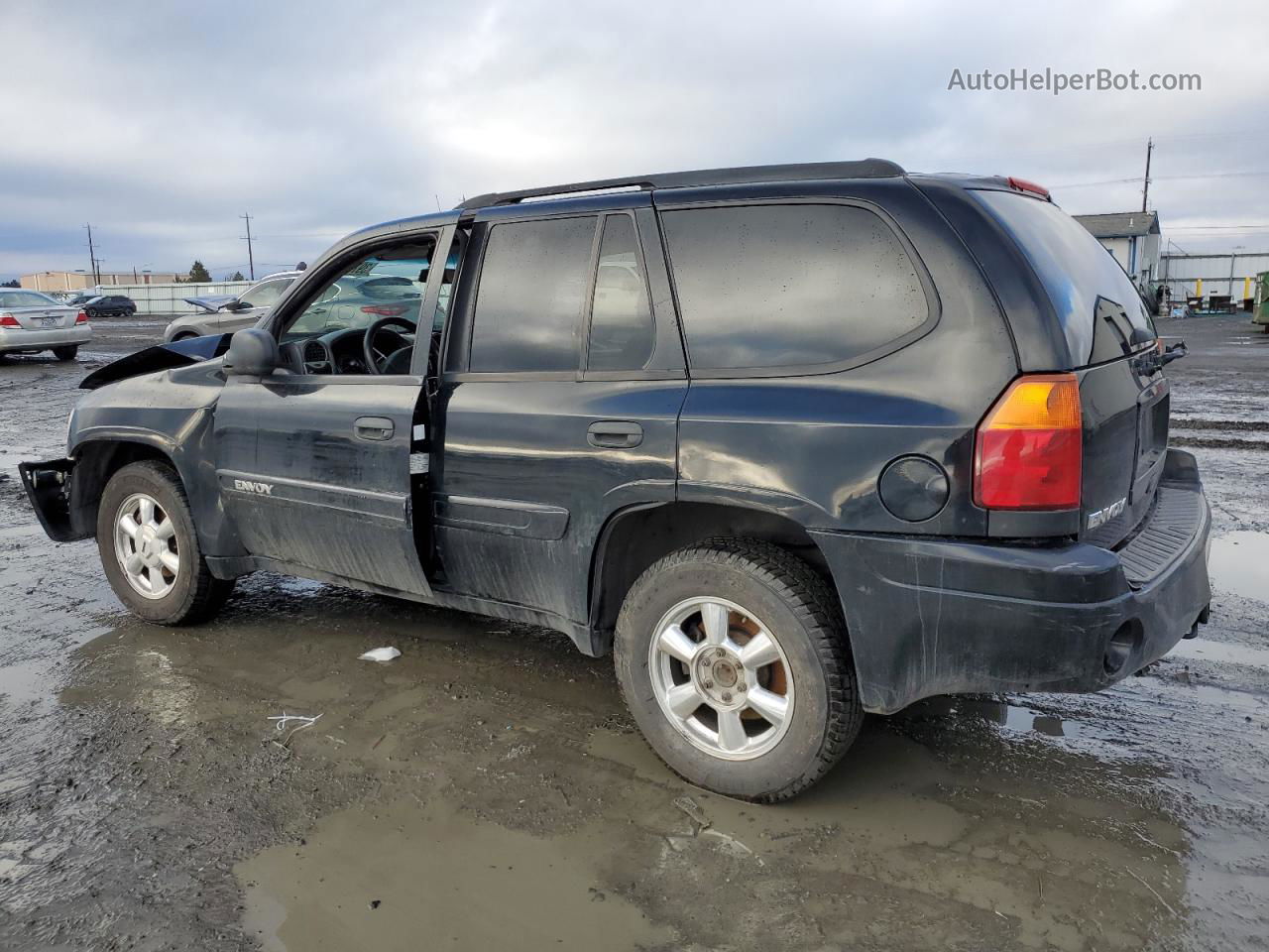 2004 Gmc Envoy  Black vin: 1GKDT13S642129404