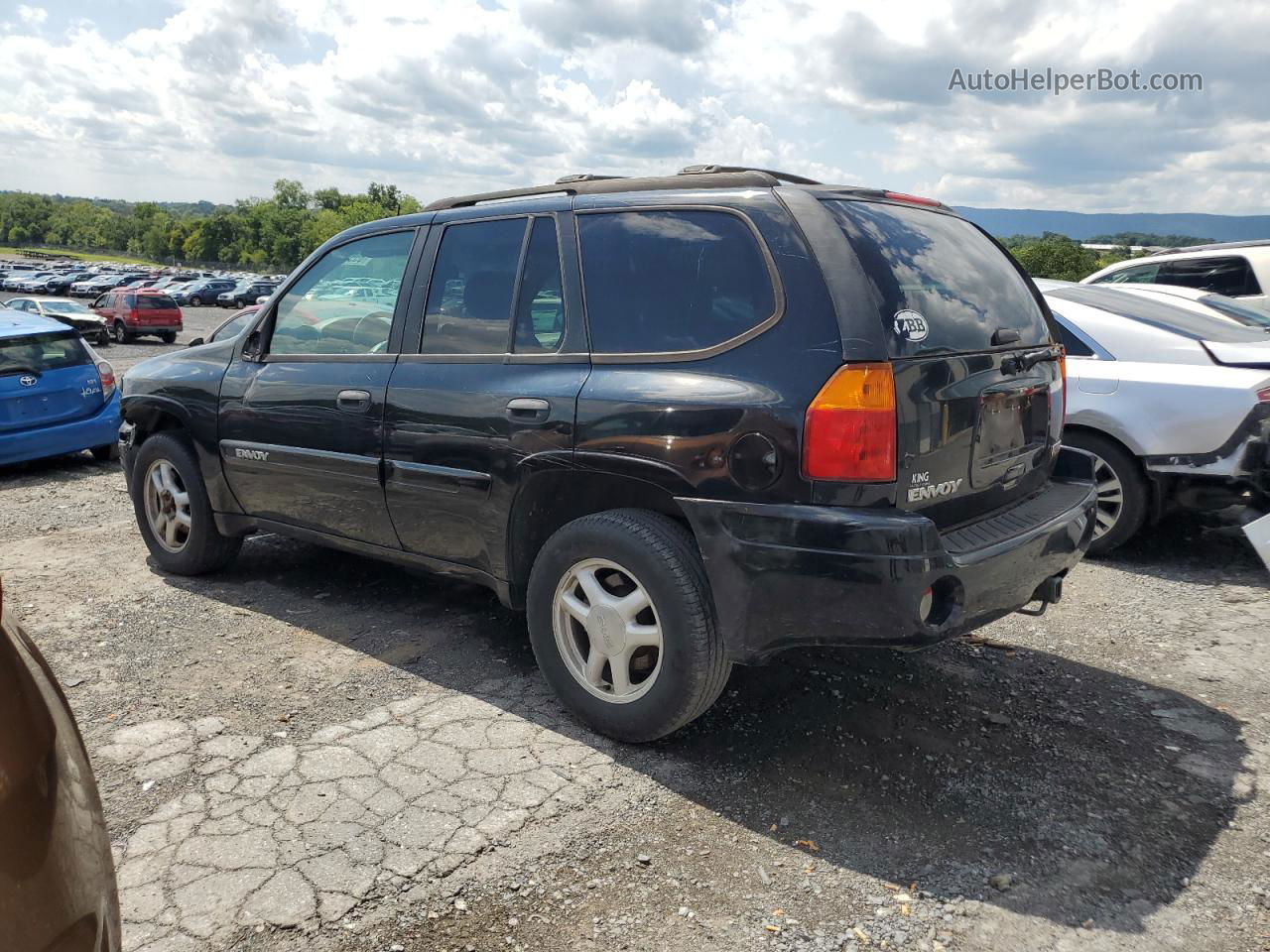 2004 Gmc Envoy  Black vin: 1GKDT13S642208734