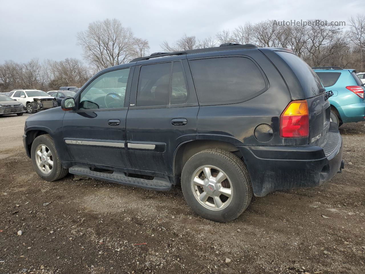 2004 Gmc Envoy  Black vin: 1GKDT13S642399037