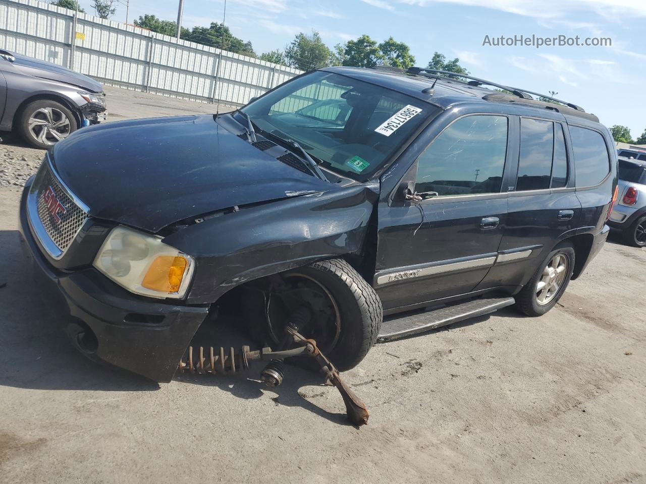 2004 Gmc Envoy  Black vin: 1GKDT13SX42403770