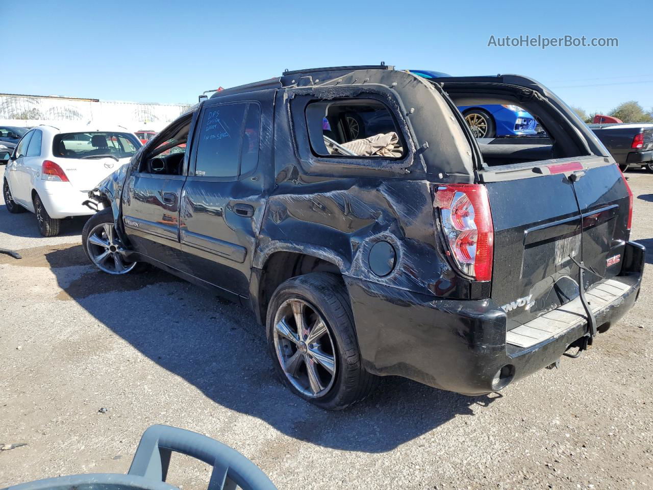 2004 Gmc Envoy Xuv Black vin: 1GKES12SX46165842