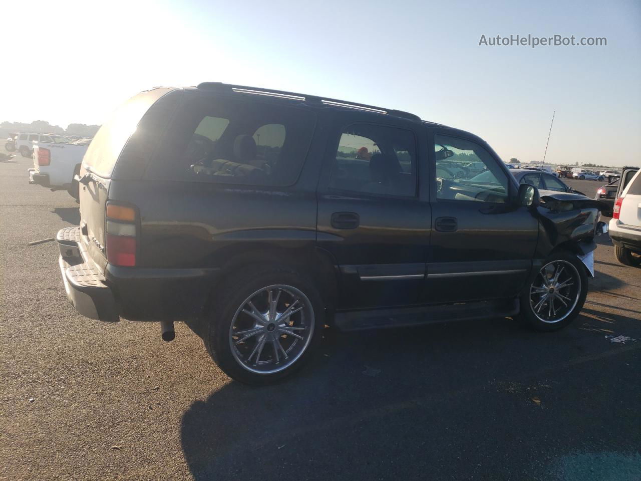 2004 Chevrolet Tahoe C1500 Black vin: 1GNEC13V54J304524