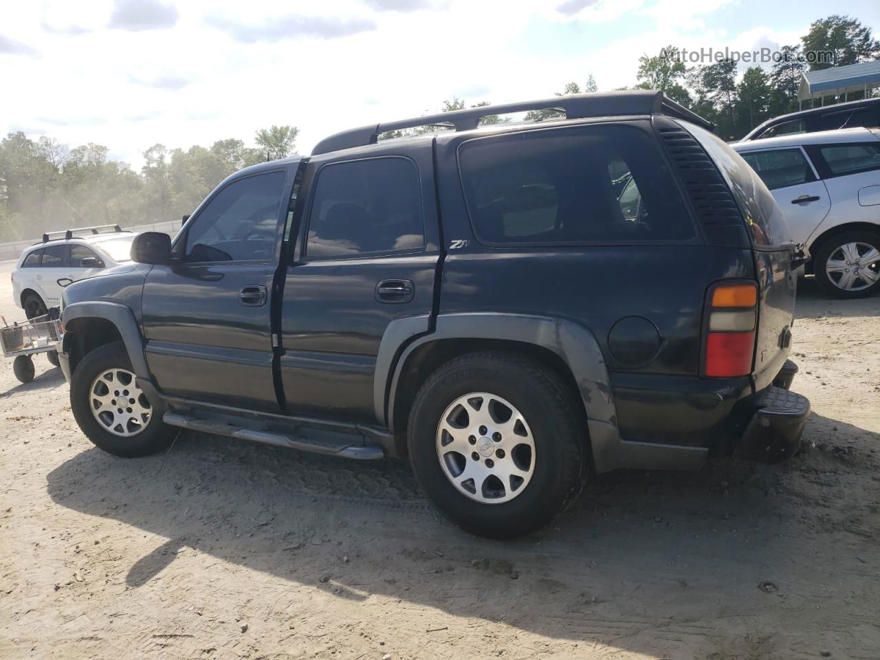 2004 Chevrolet Tahoe K1500 Black vin: 1GNEK13Z94R184119