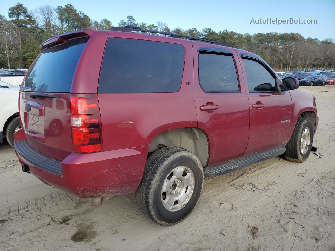 2007 Chevrolet Tahoe K1500 Burgundy vin: 1GNFK13057J143429