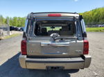 2006 Jeep Commander Limited Золотой vin: 1J8HG582X6C200224