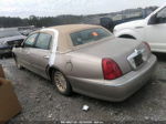 1999 Lincoln Town Car Signature Beige vin: 1LNFM82W0XY607117