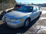 1999 Lincoln Town Car Signature Серебряный vin: 1LNFM82W8XY603431