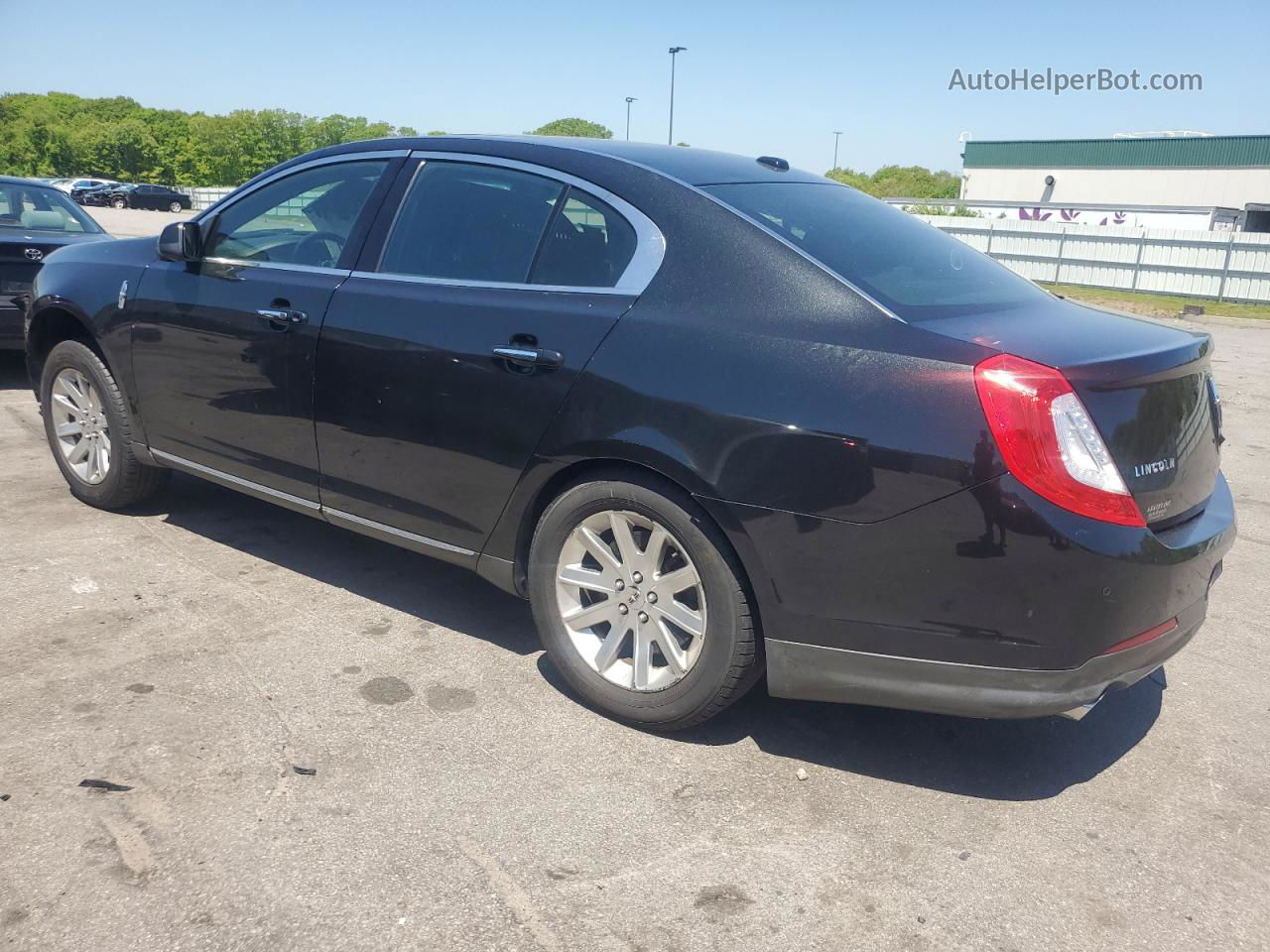 2014 Lincoln Mks  Black vin: 1LNHL9EK8EG607797