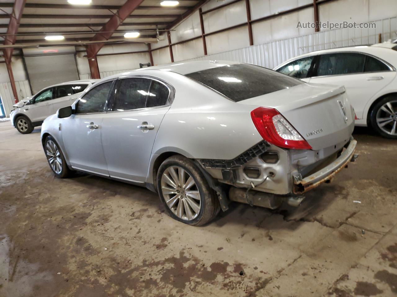 2014 Lincoln Mks  Silver vin: 1LNHL9FT6EG608504