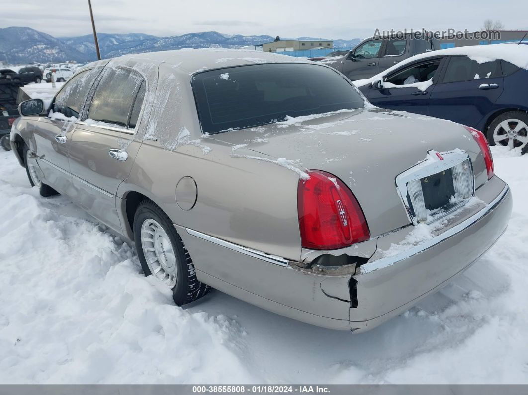 1999 Lincoln Town Car Executive Tan vin: 1LNHM81W4XY700006