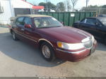 1999 Lincoln Town Car Executive Бордовый vin: 1LNHM81WXXY720678