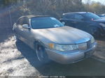 1999 Lincoln Town Car Signature Желто-коричневый vin: 1LNHM82W1XY628065