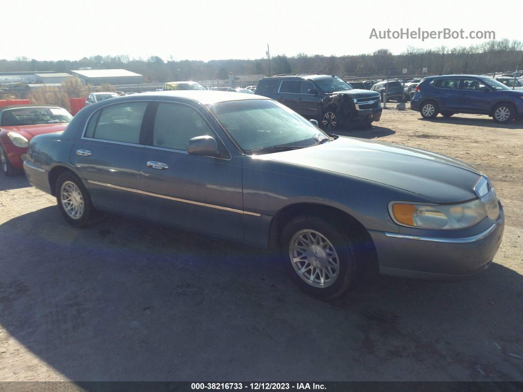 1999 Lincoln Town Car Signature Blue vin: 1LNHM82W2XY628981