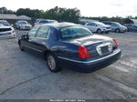 1999 Lincoln Town Car Signature Blue vin: 1LNHM82W4XY673193