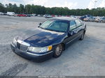 1999 Lincoln Town Car Signature Blue vin: 1LNHM82W4XY673193