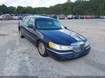 1999 Lincoln Town Car Signature Blue vin: 1LNHM82W4XY673193