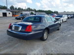 1999 Lincoln Town Car Signature Blue vin: 1LNHM82W4XY673193