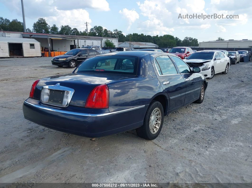 1999 Lincoln Town Car Signature Blue vin: 1LNHM82W4XY673193