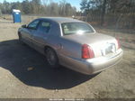 1999 Lincoln Town Car Signature Желто-коричневый vin: 1LNHM82W8XY677909