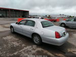 1999 Lincoln Town Car Signature Серебряный vin: 1LNHM82W9XY624345