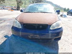 2004 Toyota Corolla Le Blue vin: 1NXBR32EX4Z275989