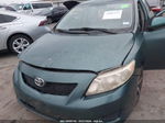 2010 Toyota Corolla Le Green vin: 1NXBU4EE1AZ324198