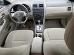 2010 Toyota Corolla Base Золотой vin: 1NXBU4EE1AZ336738