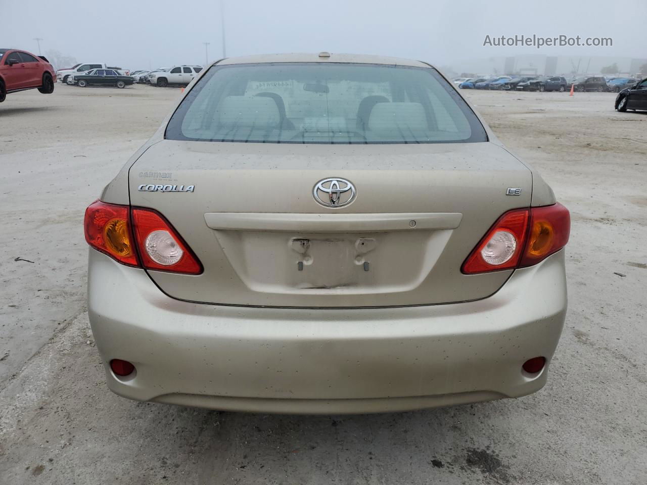 2010 Toyota Corolla Base Золотой vin: 1NXBU4EE5AZ230731