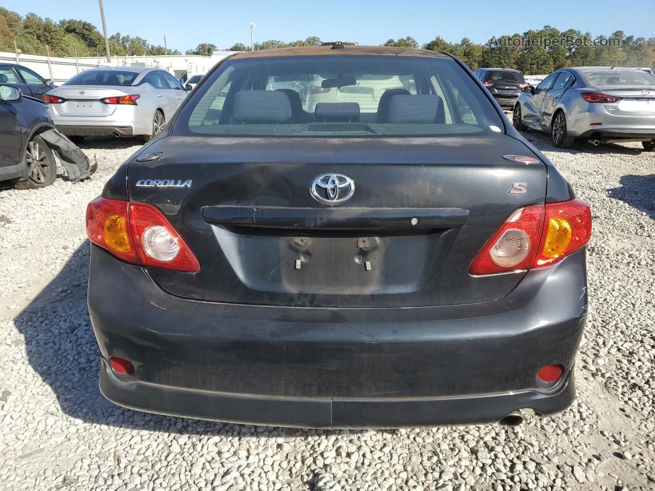 2010 Toyota Corolla Base Black vin: 1NXBU4EEXAZ221779