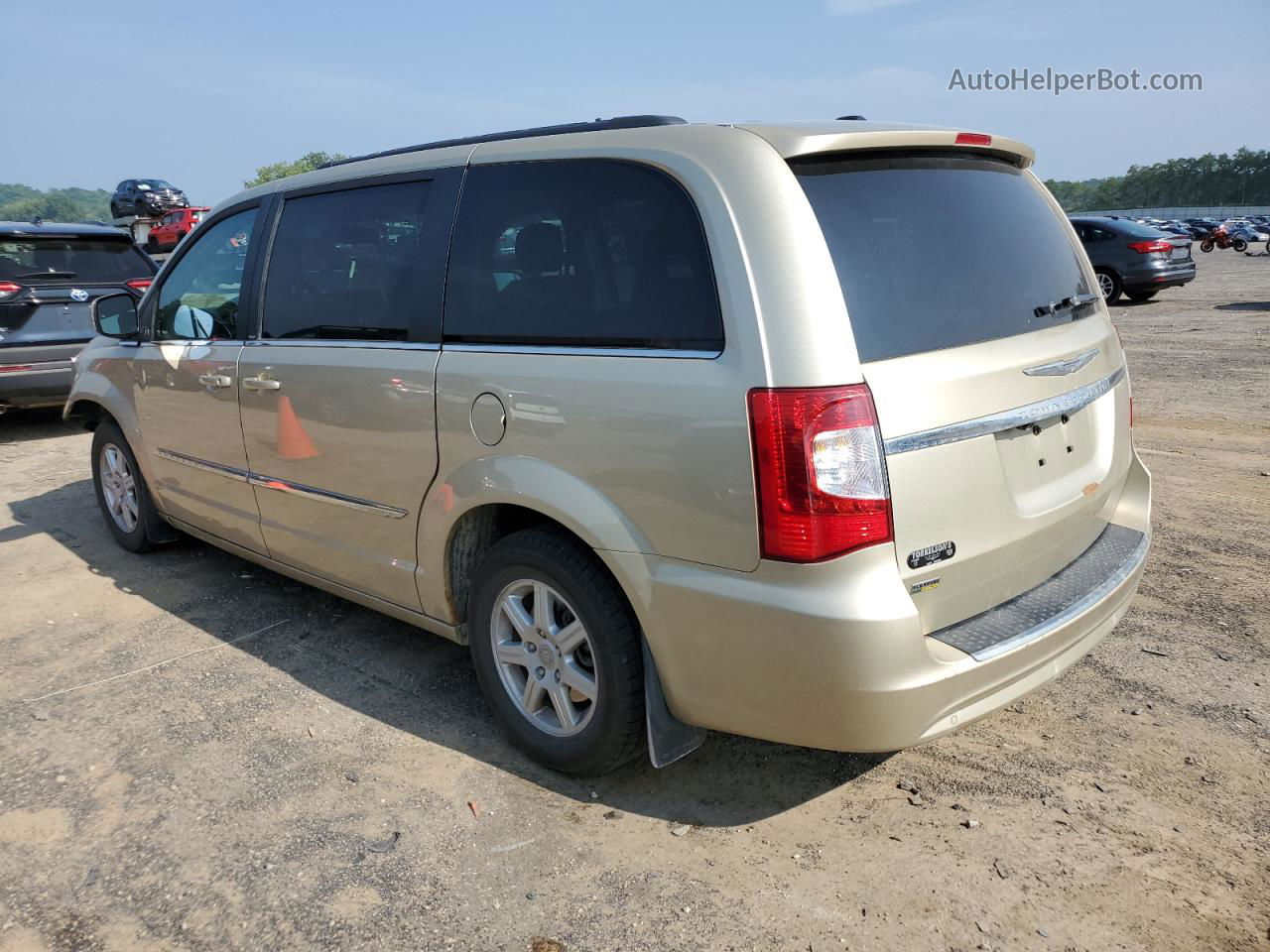 2011 Chrysler Town & Country Touring Золотой vin: 2A4RR5DG6BR694603