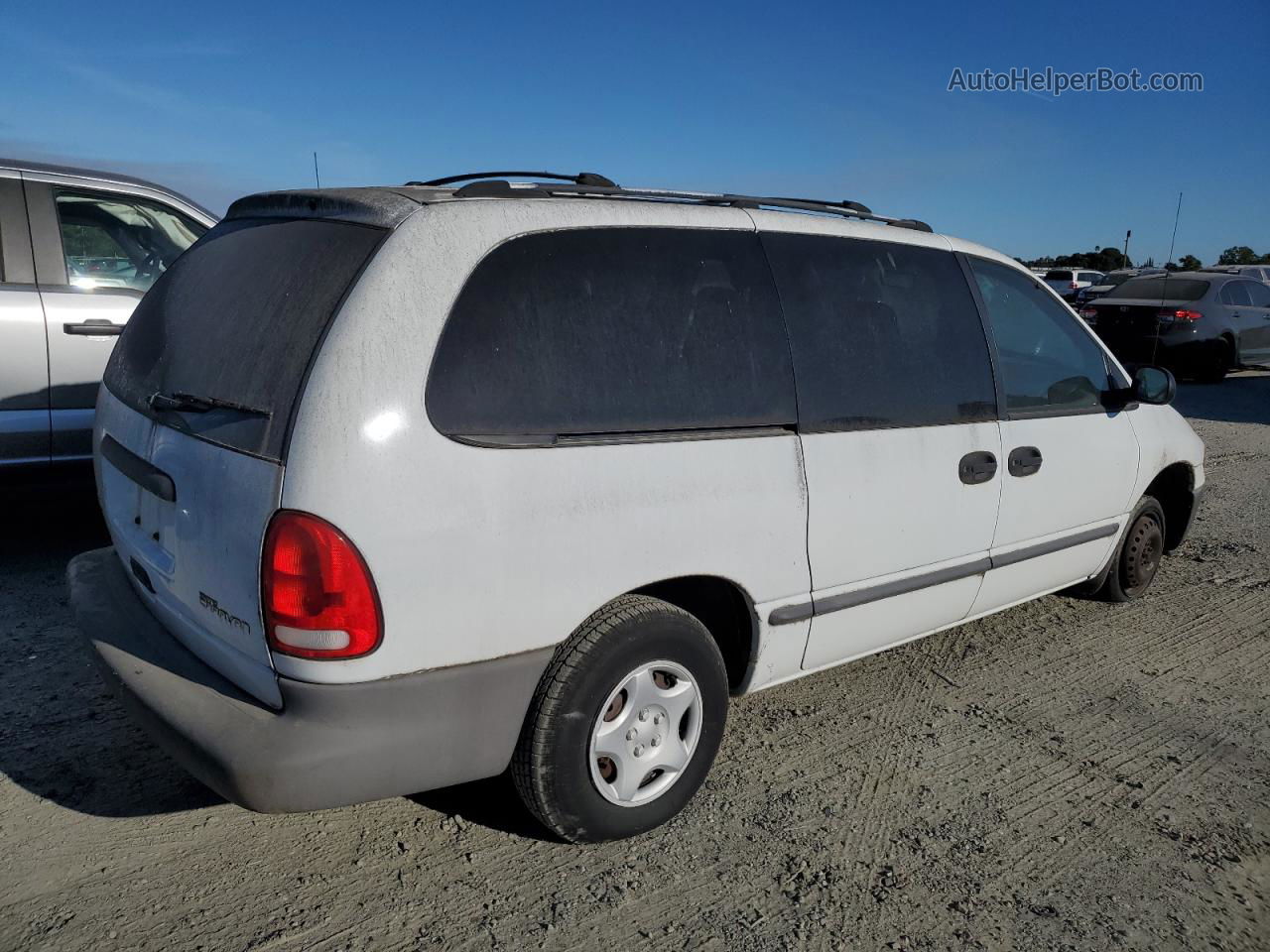 2000 Dodge Grand Caravan  White vin: 2B4GP24R6YR535251