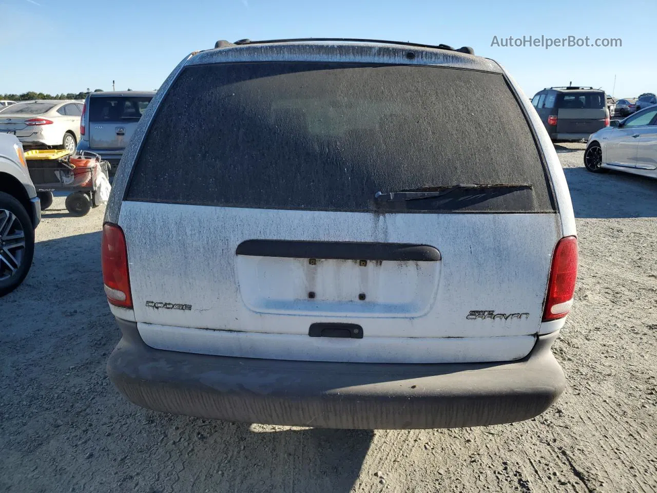 2000 Dodge Grand Caravan  White vin: 2B4GP24R6YR535251