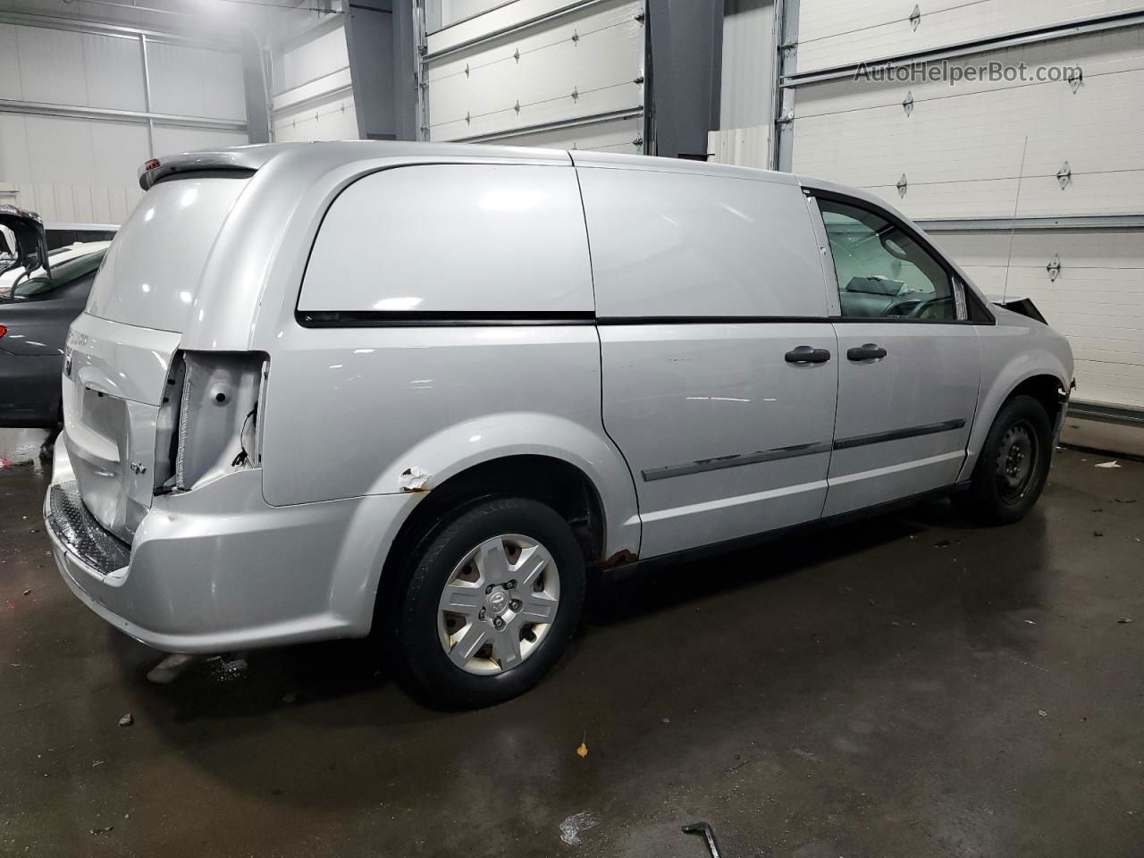 2012 Dodge Ram Van  Silver vin: 2C4RDGAG5CR261263