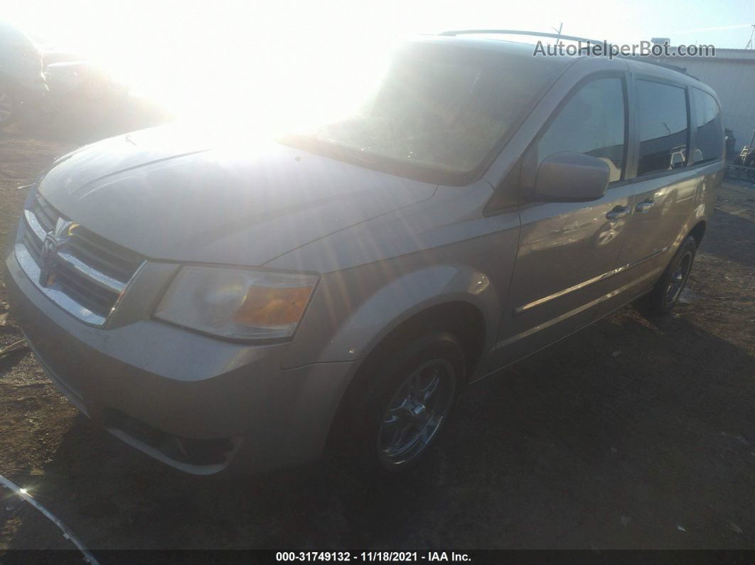 2009 Dodge Grand Caravan Sxt Золотой vin: 2D8HN54189R667195