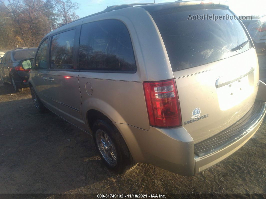 2009 Dodge Grand Caravan Sxt Золотой vin: 2D8HN54189R667195