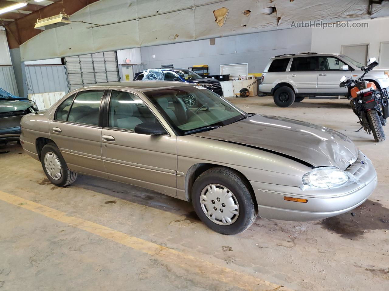 1999 Chevrolet Lumina Base Beige vin: 2G1WL52M0X9251883