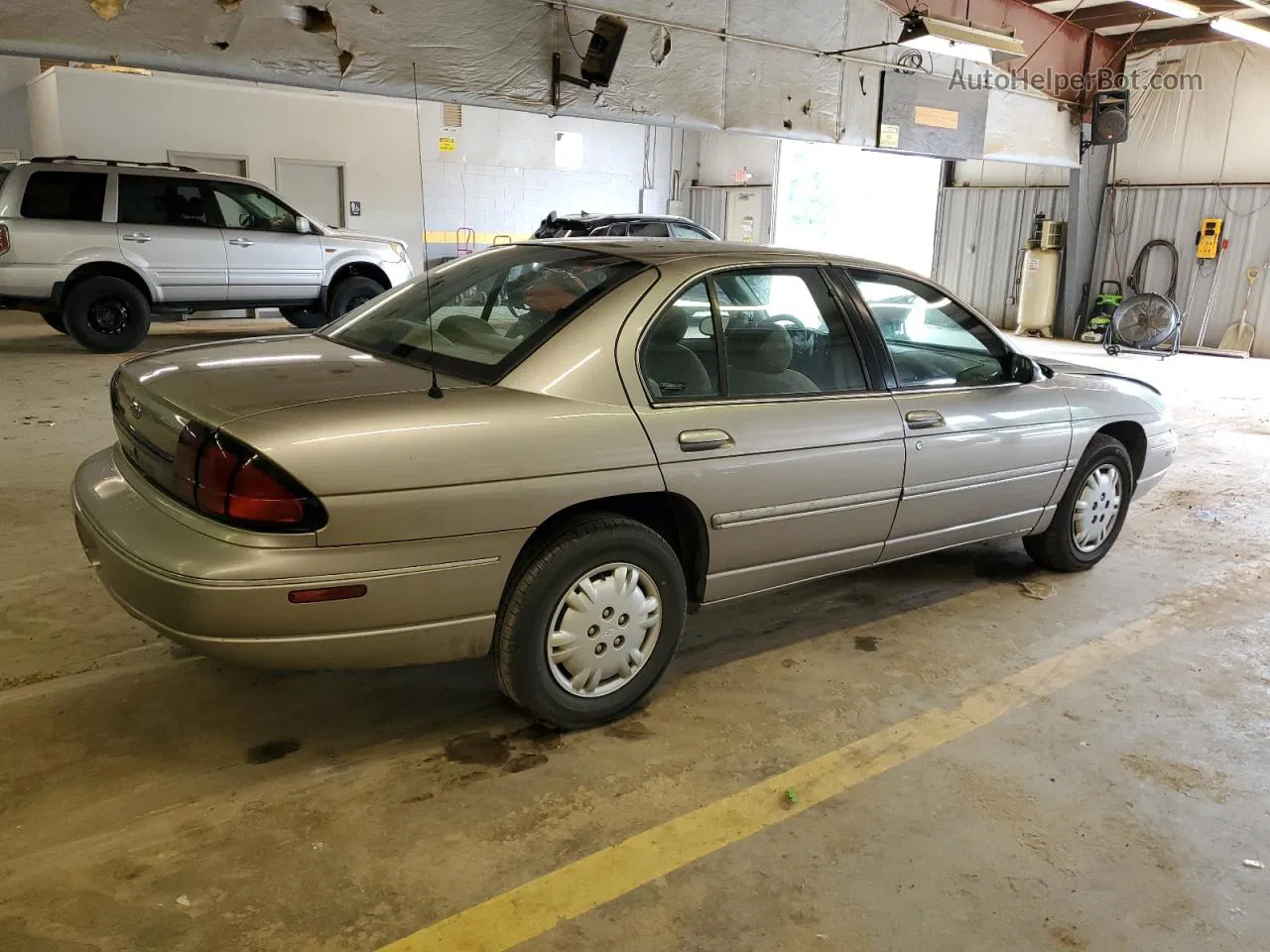 1999 Chevrolet Lumina Base Beige vin: 2G1WL52M0X9251883