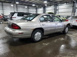 1999 Chevrolet Lumina Base Tan vin: 2G1WL52M1X9240066