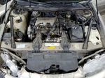 1999 Chevrolet Lumina Base Tan vin: 2G1WL52M1X9240066