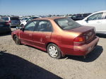 2002 Toyota Corolla Ce Red vin: 2T1BR12E72C556800