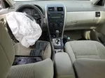 2010 Toyota Corolla Base Золотой vin: 2T1BU4EE2AC410900