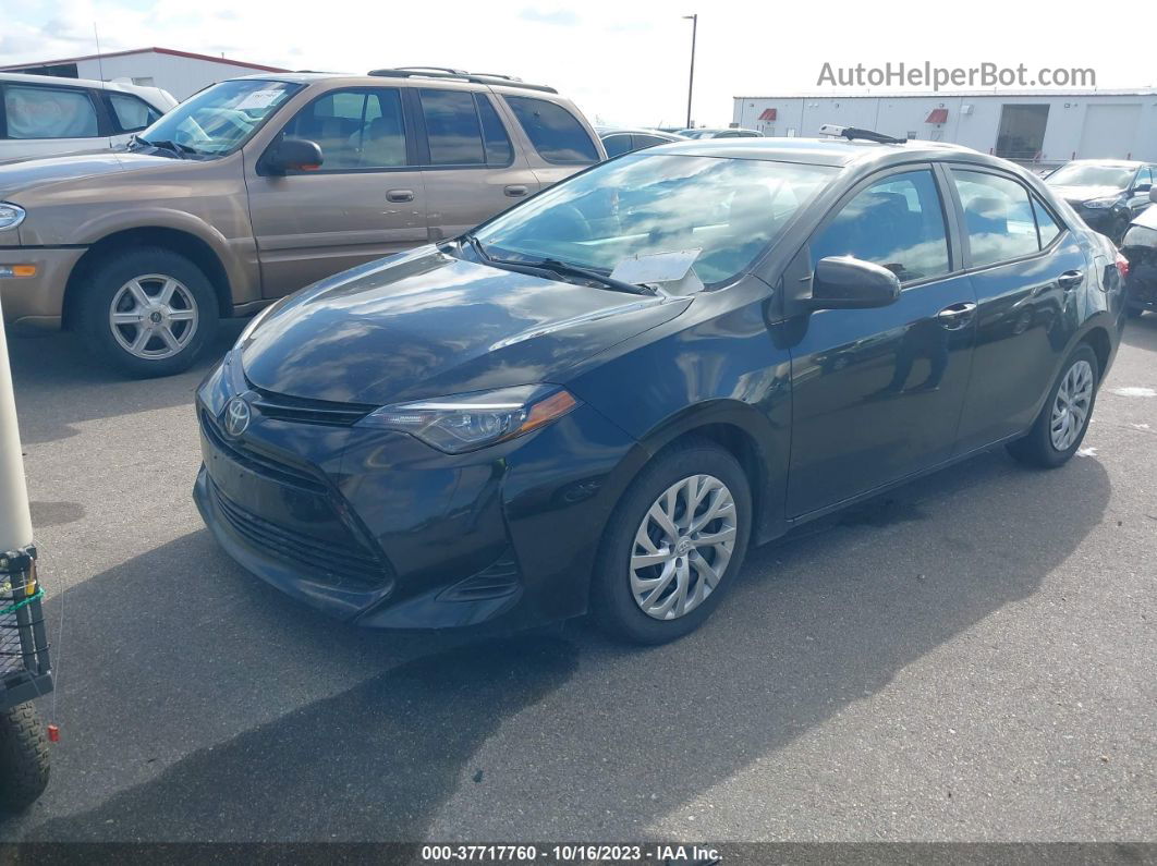 2019 Toyota Corolla Le Black vin: 2T1BURHE0KC234665