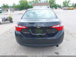 2016 Toyota Corolla Le Black vin: 2T1BURHE6GC707072