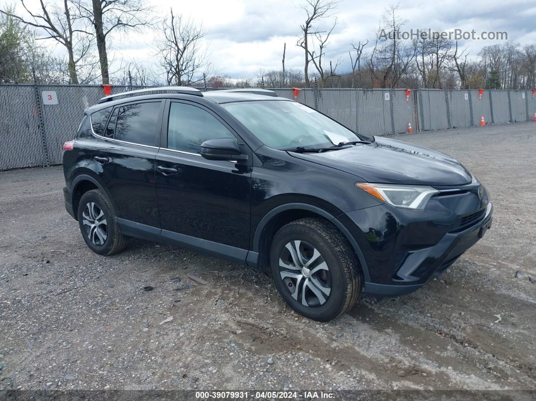 2017 Toyota Rav4 Le Black vin: 2T3BFREV9HW604606