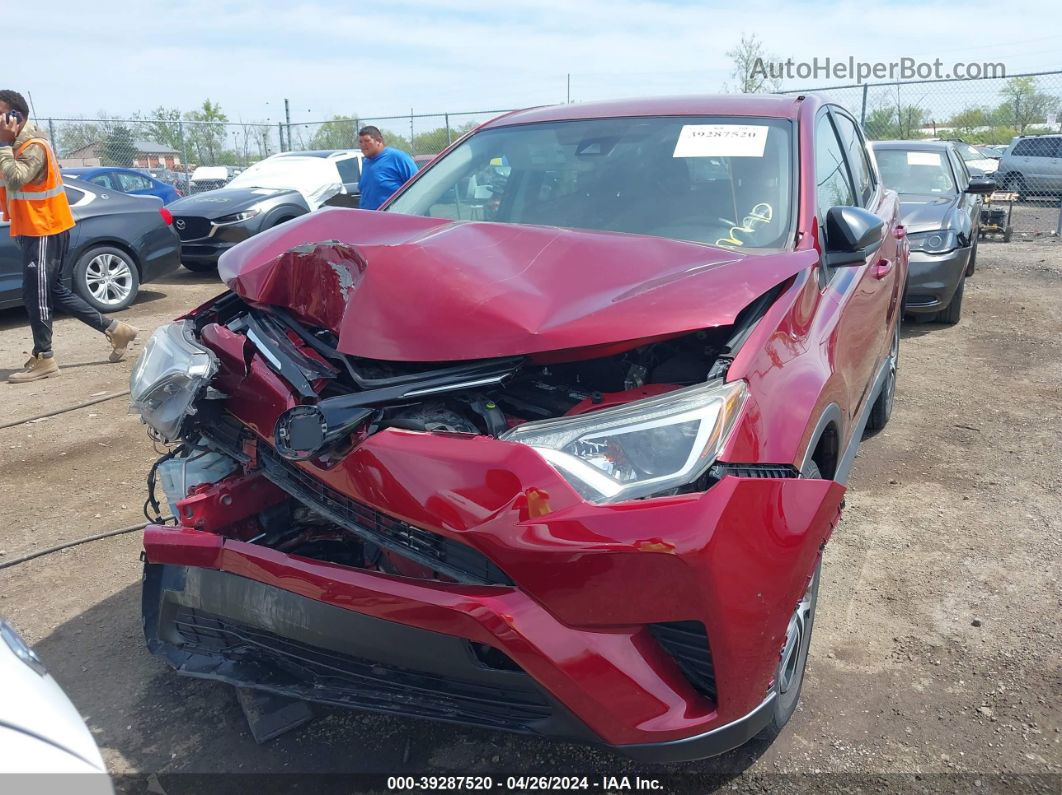 2018 Toyota Rav4 Le Red vin: 2T3BFREV9JW763695