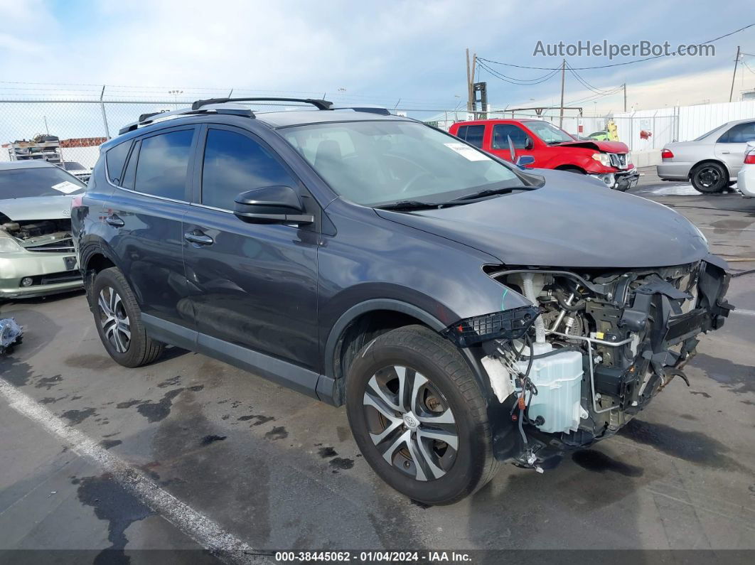 2016 Toyota Rav4 Le Gray vin: 2T3ZFREV3GW296006