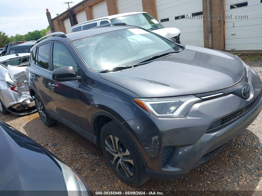 2018 Toyota Rav4 Le Gray vin: 2T3ZFREV3JW488436