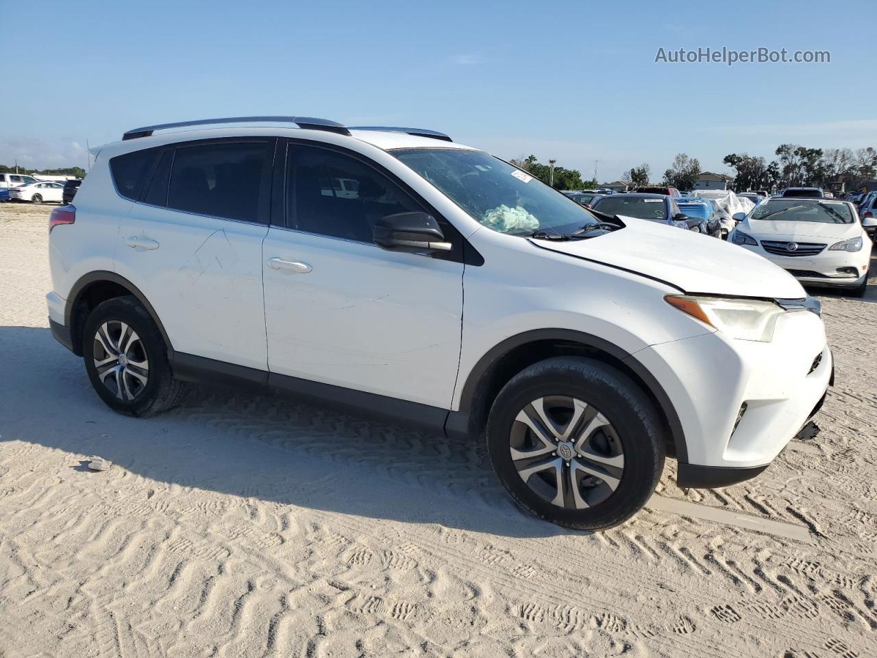 2016 Toyota Rav4 Le White vin: 2T3ZFREV6GW285582