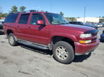 2005 Chevrolet Suburban K1500 Maroon vin: 3GNFK16Z85G198398